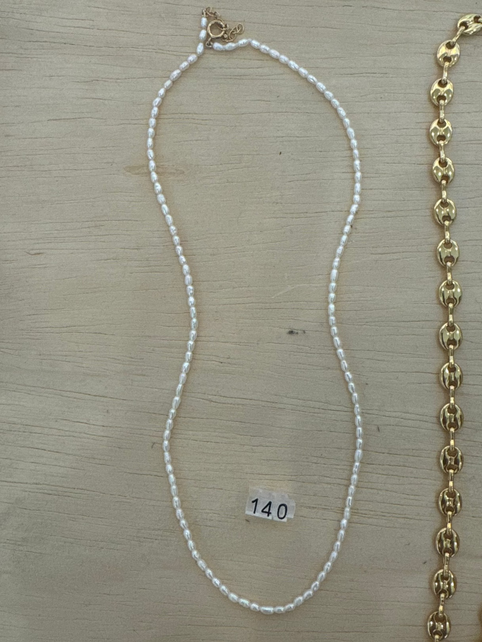 TINY PEARL STRAND NECKLACE